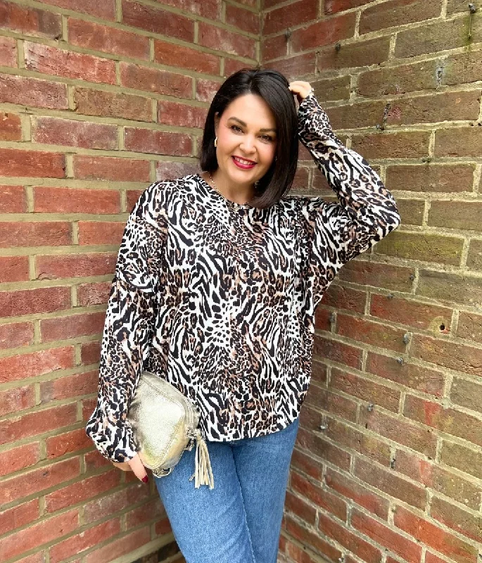 women's tops for those who want to stay cool and chic during warmer weatherAnimal Print Batwing Top