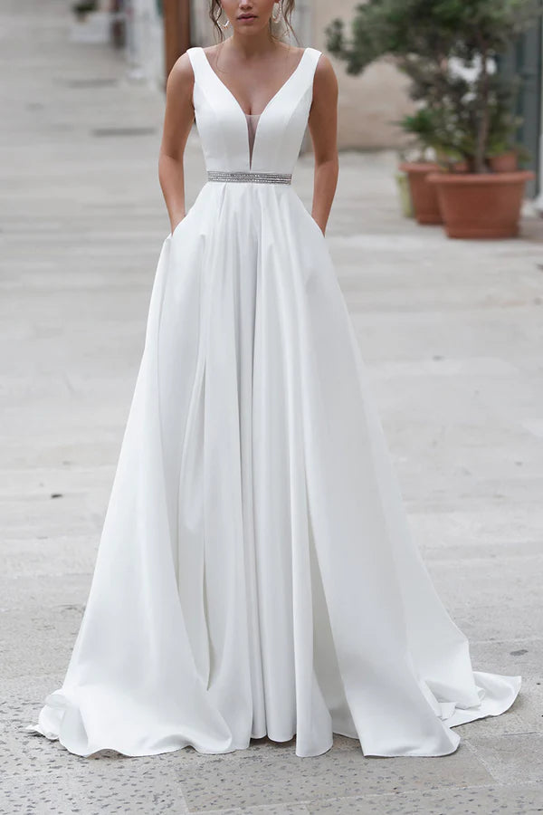 Plunging Neckline DressA-shaped deep V-neck satin wedding dress with pockets court tail minimalist bride dress